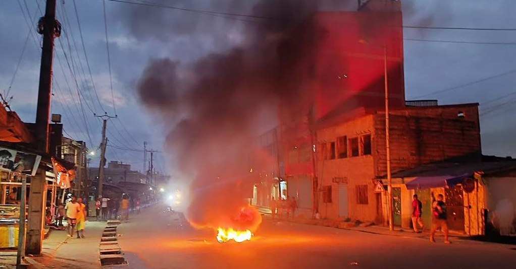 Composite image showing U.S. Senate tweet, EU statement and street protests in Douala and Yaoundé as Western partners withhold recognition and UN/Reuters confirm 49 deaths.