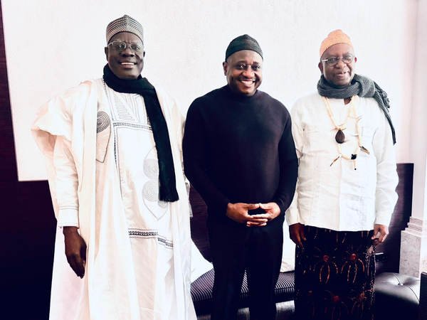 From left to right: His Excellency Minister Mounouna Foutsou, His Royal Highness Dr. Foimuki (center), and Ambassador Ndocki Victor. From left to right: His Excellency Minister Mounouna Foutsou, His Royal Highness Dr. Foimuki (center), and Ambassador Ndocki Victor.